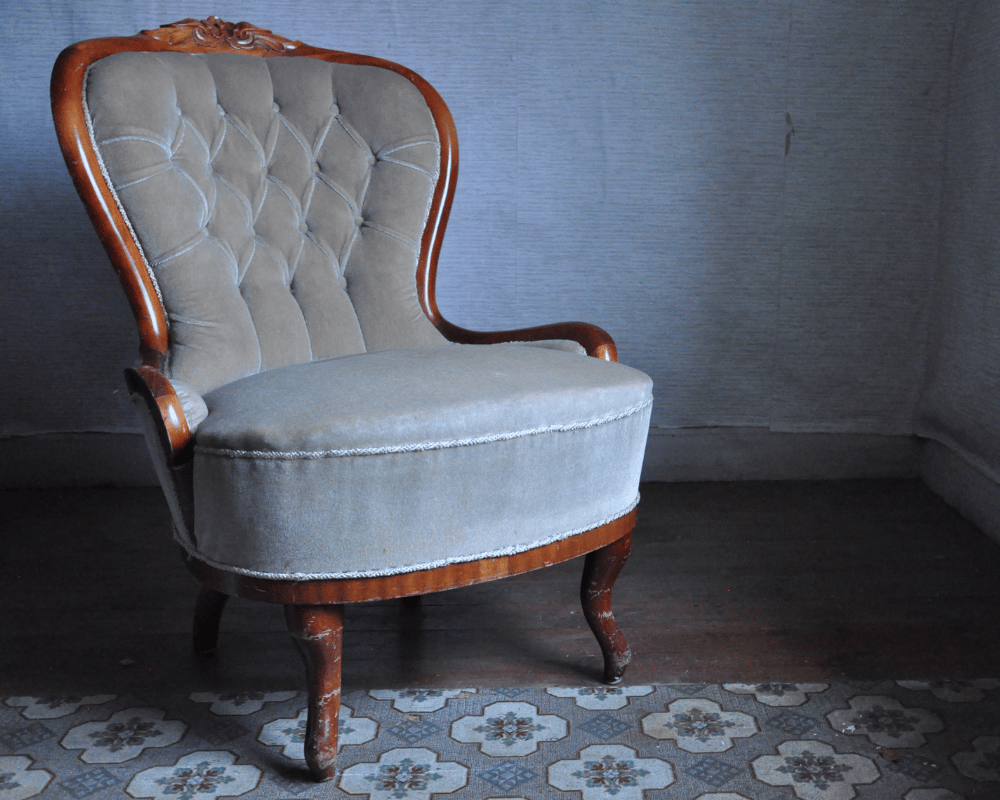 En grön fåtölj, vintage.